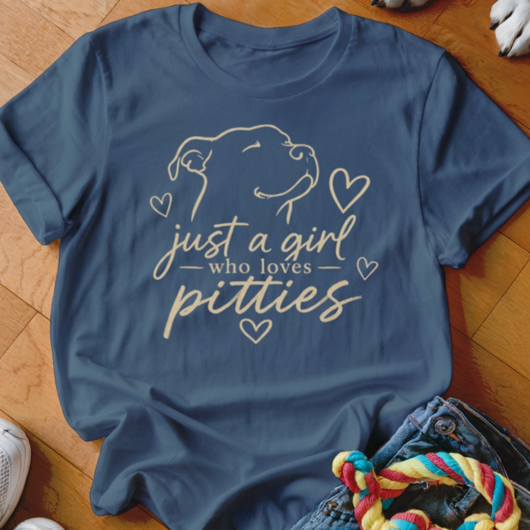 Navy t-shirt with line art of a dog and text "just a girl who loves pitties."
