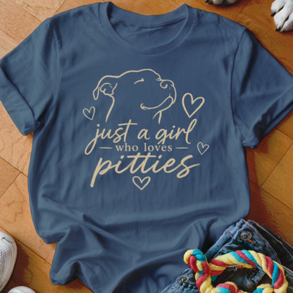 Navy t-shirt with line art of a dog and text "just a girl who loves pitties."