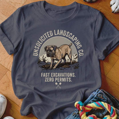 T-shirt with dog digging and text: UNSOLICITED LANDSCAPING CO. FAST EXCAVATIONS. ZERO PERMITS.
