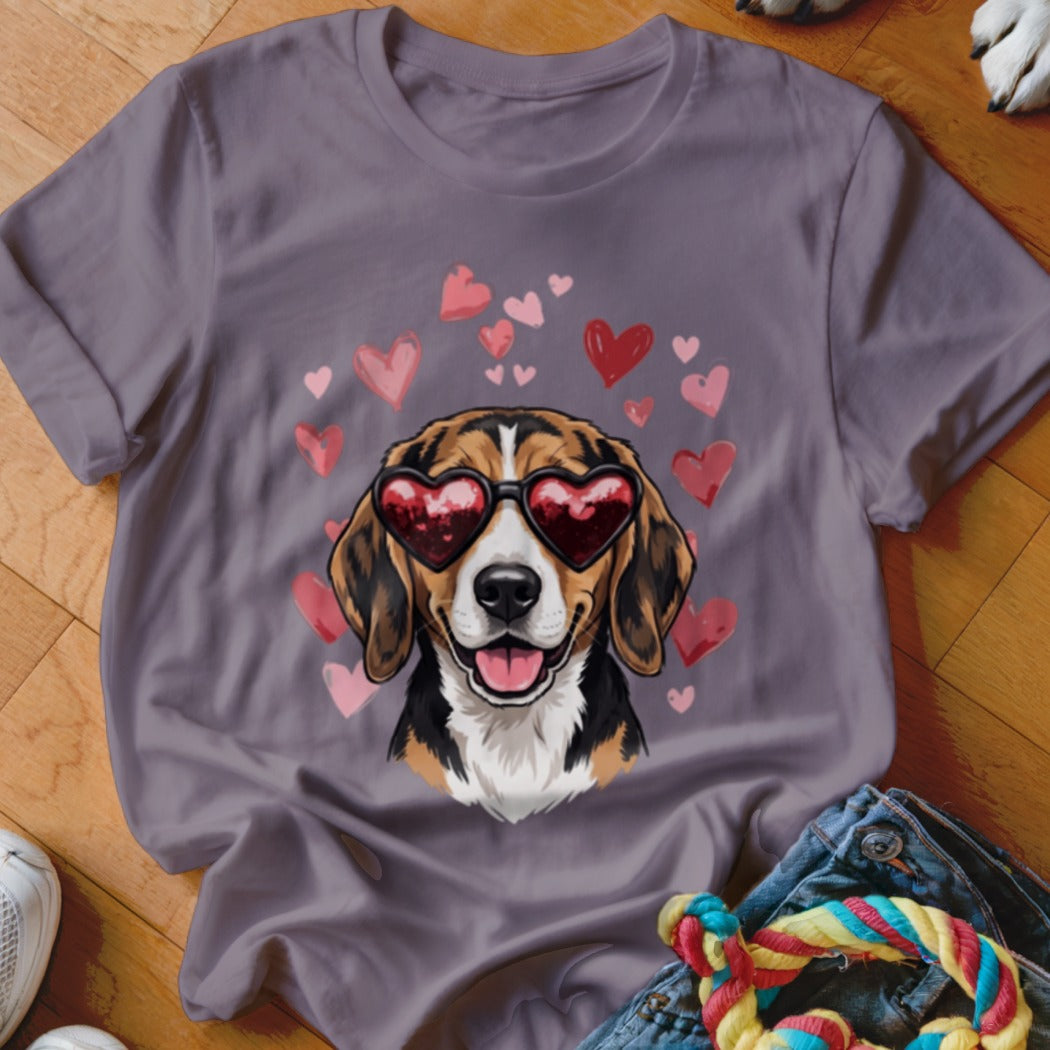 A grey crewneck t-shirt featuring a graphic of a beagle wearing heart-shaped sunglasses, surrounded by pink hearts.