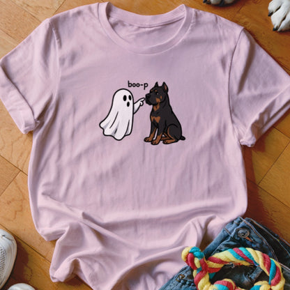 Pink t-shirt with a ghost saying "boo-p" to a seated Rottweiler dog.
