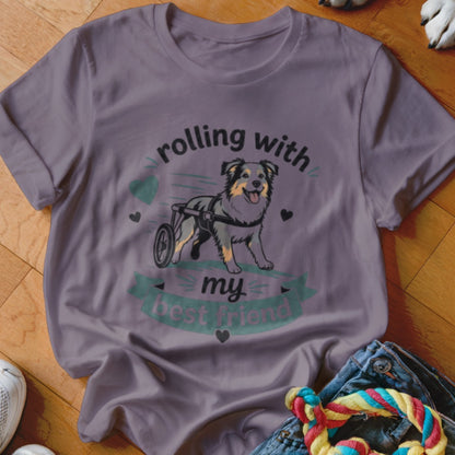 T-shirt with a dog in a wheelchair and text "rolling with my best friend."