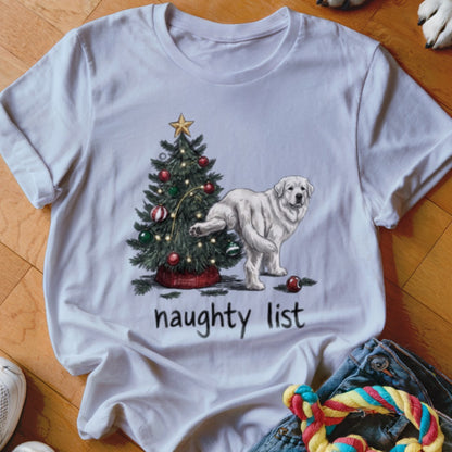 A white t-shirt featuring a graphic of a dog lifting its leg against a Christmas tree, with the text "naughty list" below.