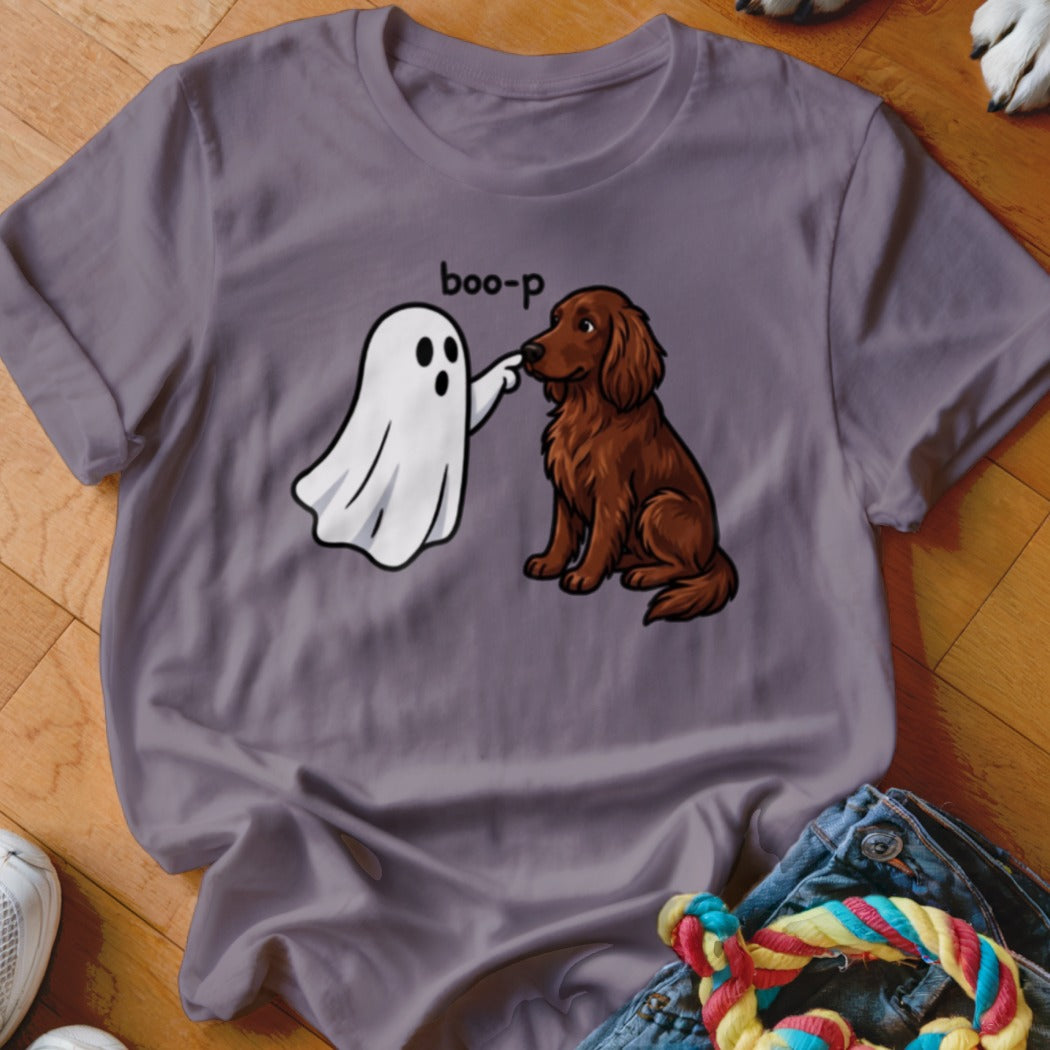 Ghost booping a brown dog with "boo-p" text on a purple t-shirt.
