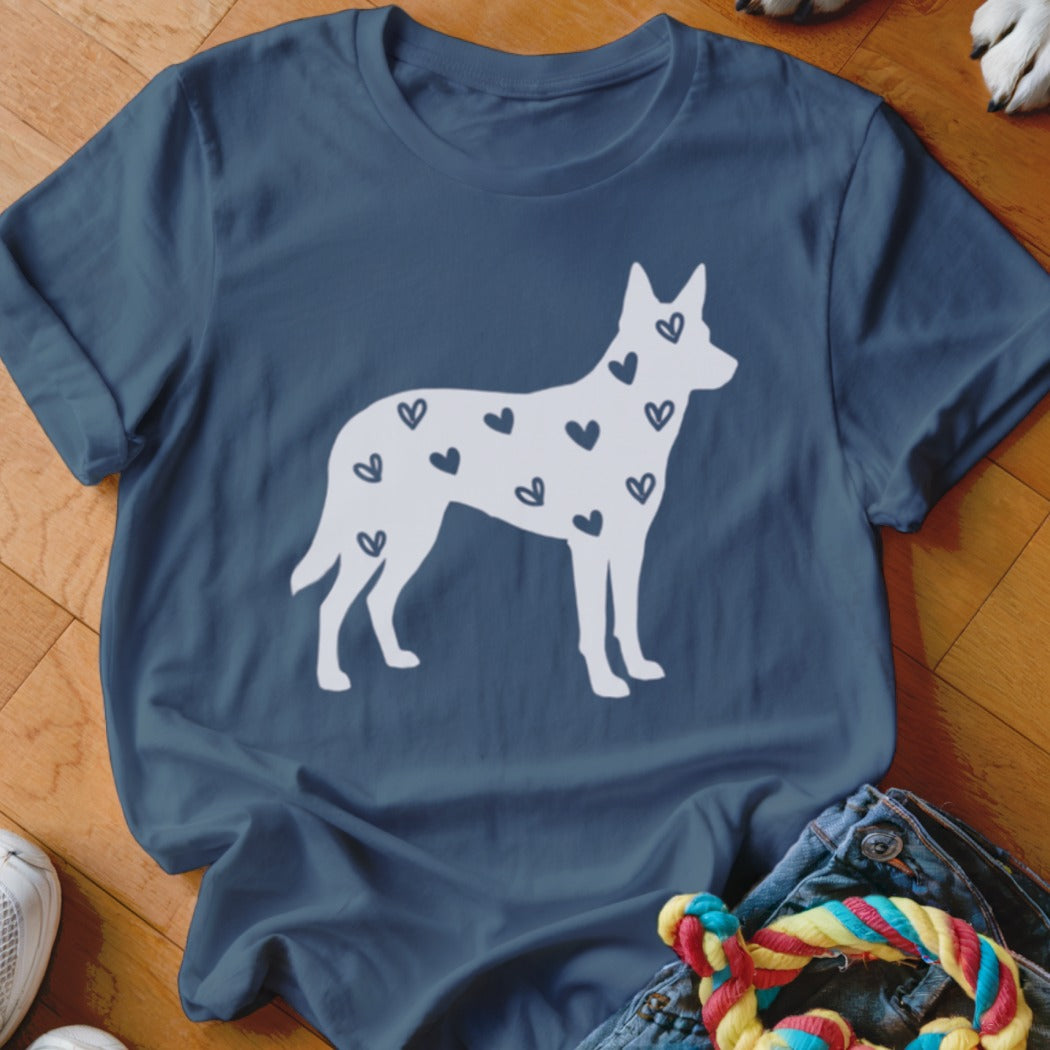 White dog silhouette with blue hearts on a dark blue t-shirt.