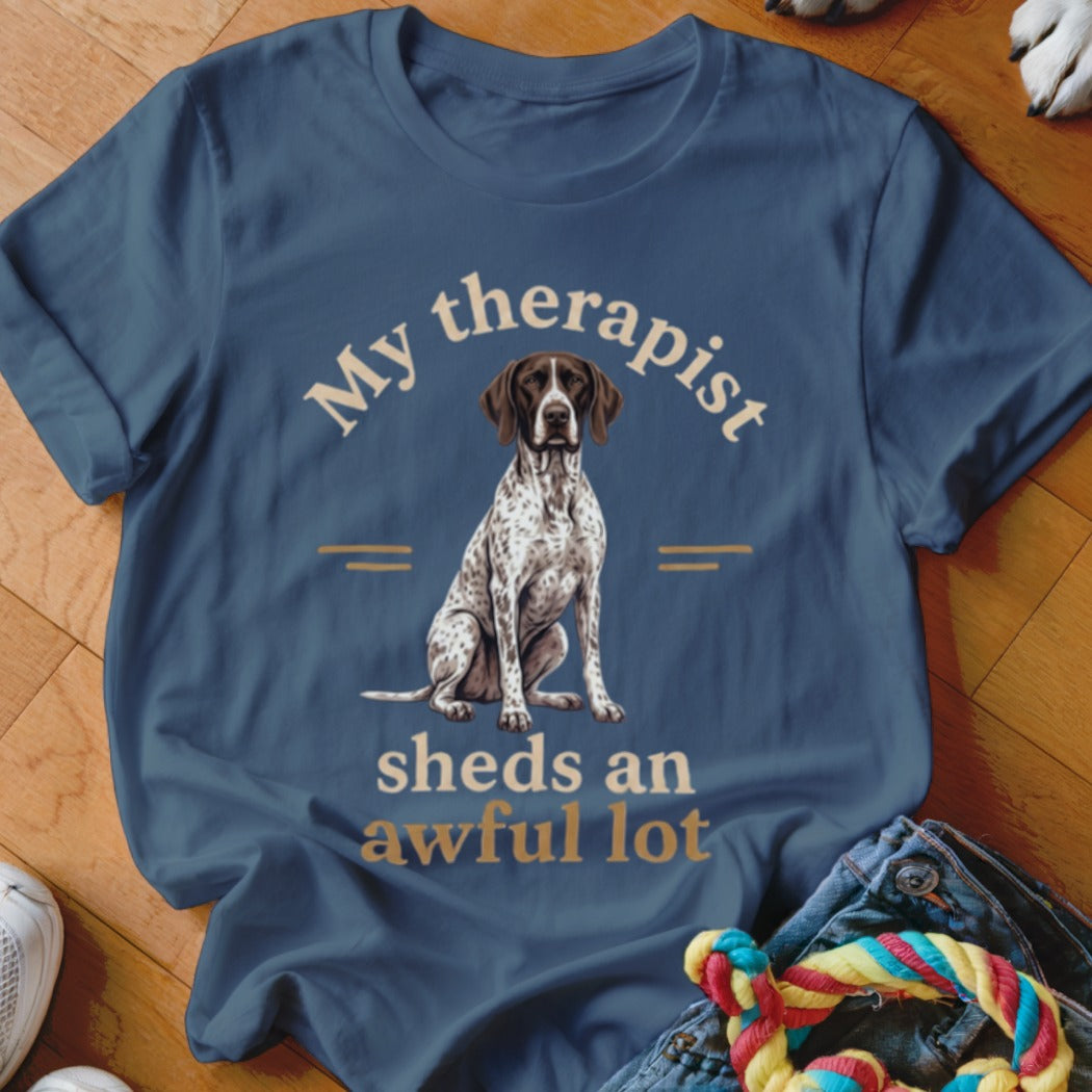 Blue t-shirt with a dog and text: "My therapist sheds an awful lot."