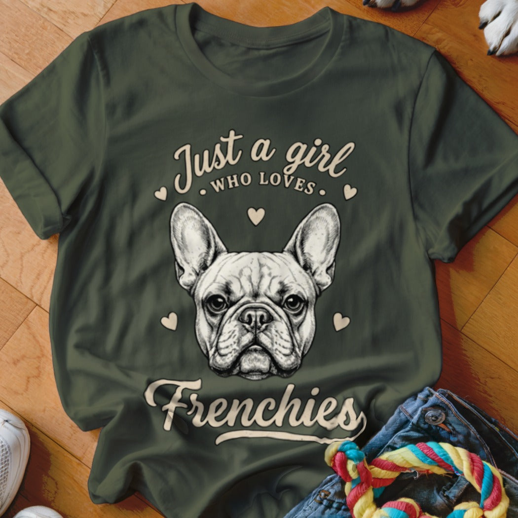 Dark green t-shirt featuring a French bulldog illustration and text that reads Just a girl who loves Frenchies.