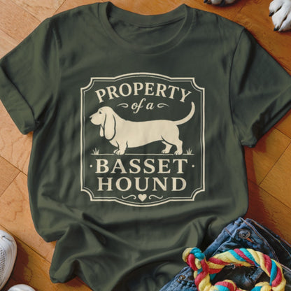 Green t-shirt with white text and illustration of a Basset Hound.