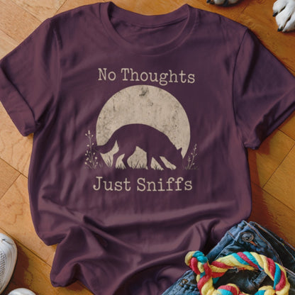 Burgundy t-shirt with "No Thoughts Just Sniffs" text and dog silhouette.