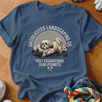 Blue t-shirt with dog digging in dirt, text "Unsolicited Landscaping Co. Fast Excavations. Zero Permits."