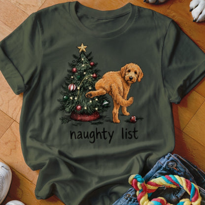 Goldendoodle near Christmas tree with ornaments and lights, "naughty list" text.