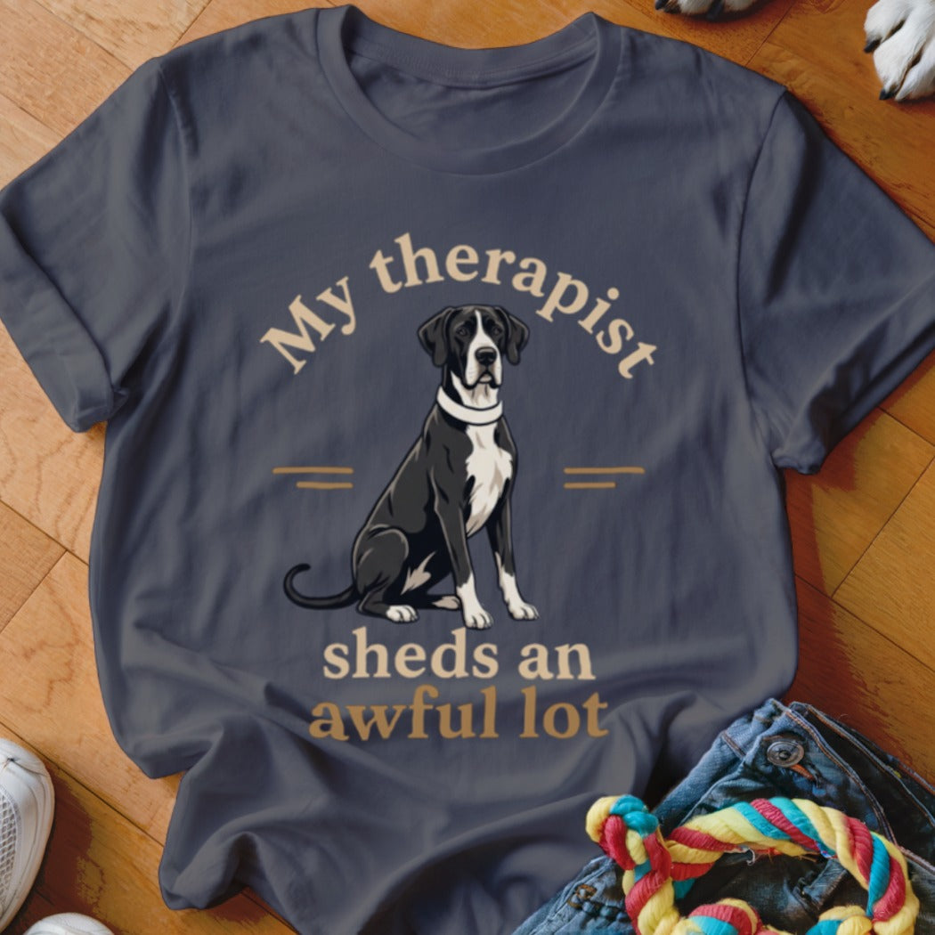 Great Dane sitting with text "My therapist sheds an awful lot".