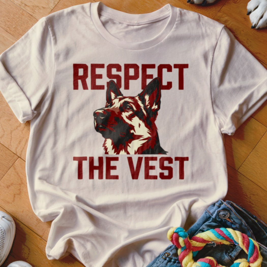 White t-shirt with graphic of German Shepherd head and text "RESPECT THE VEST".