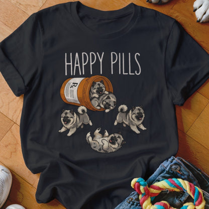 Dark t-shirt with "HAPPY PILLS" and cartoon puppies spilling from a pill bottle.