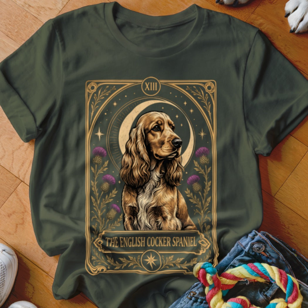 Dark green t-shirt featuring a tarot-style graphic of an English Cocker Spaniel with purple thistle flowers.