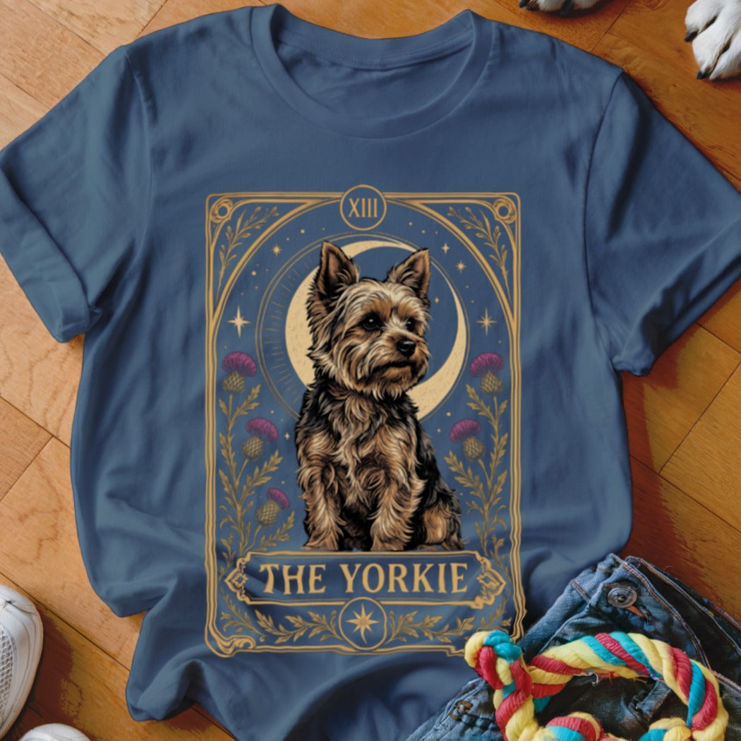 Blue t-shirt featuring a tarot card graphic of a Yorkshire terrier with flowers and the text The Yorkie.