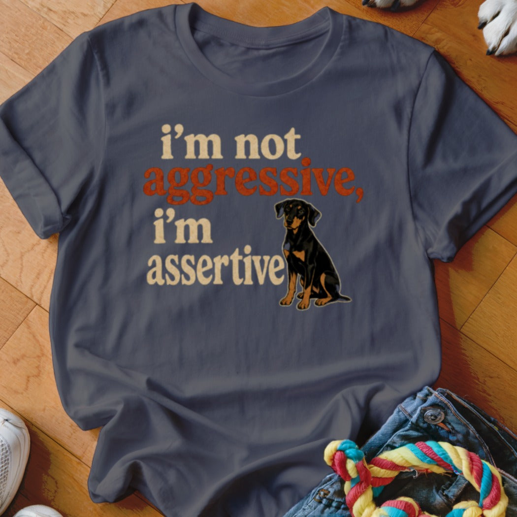Dark grey t-shirt with "i'm not aggressive, i'm assertive" and a dog graphic.
