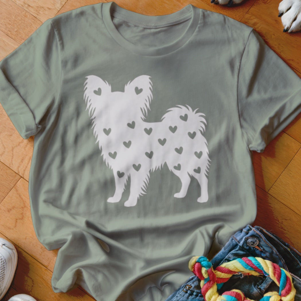 T-shirt with white dog silhouette pattern of small hearts.