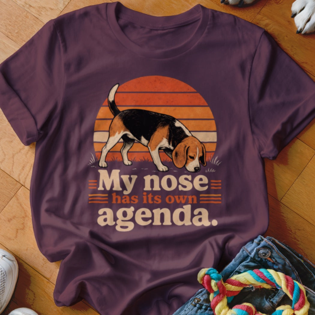 Beagle sniffing with text "My nose has its own agenda."