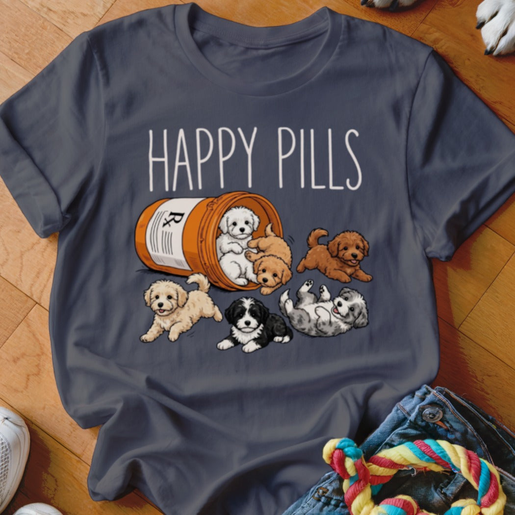 T-shirt with "HAPPY PILLS" text and cartoon puppies spilling from a pill bottle.