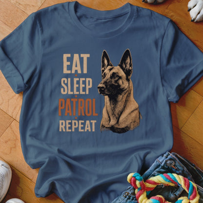 Blue t-shirt with graphic design of a Belgian Malinois dog and text EAT SLEEP PATROL REPEAT.