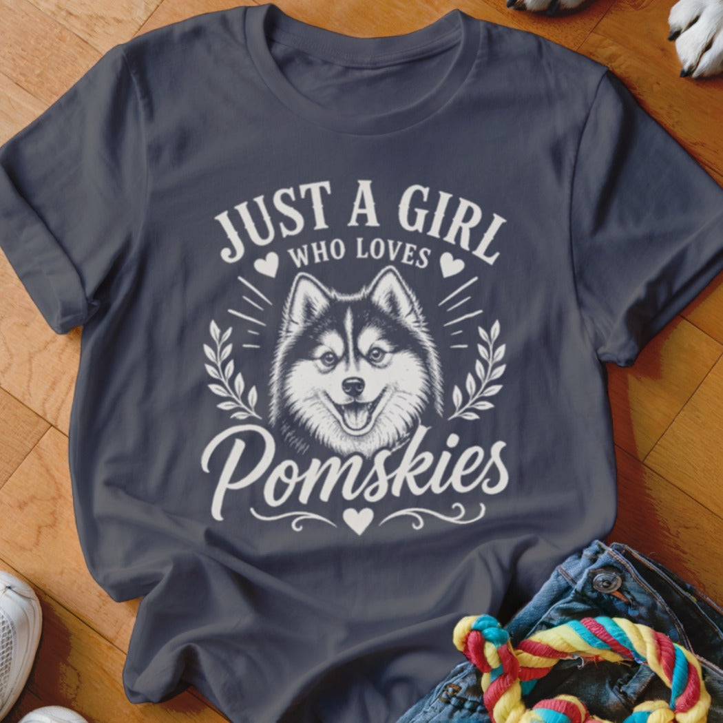 Dark t-shirt with "Just a Girl Who Loves Pomskies" and dog graphic.