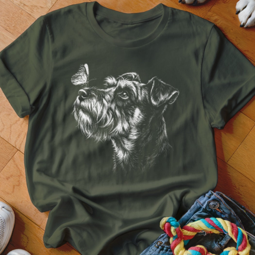 Dark green t-shirt featuring a white sketch of a terrier looking at a butterfly on its nose.
