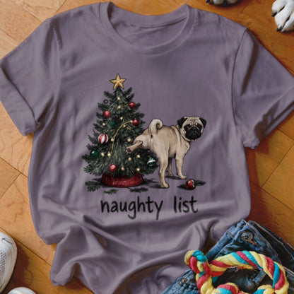 Purple t-shirt featuring a pug lifting its leg against a decorated Christmas tree, with the text naughty list underneath.