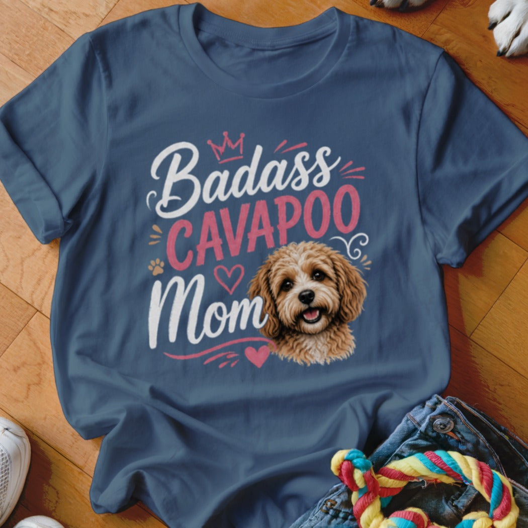 Navy t-shirt with "Badass Cavapoo Mom" text and Cavapoo dog graphic.