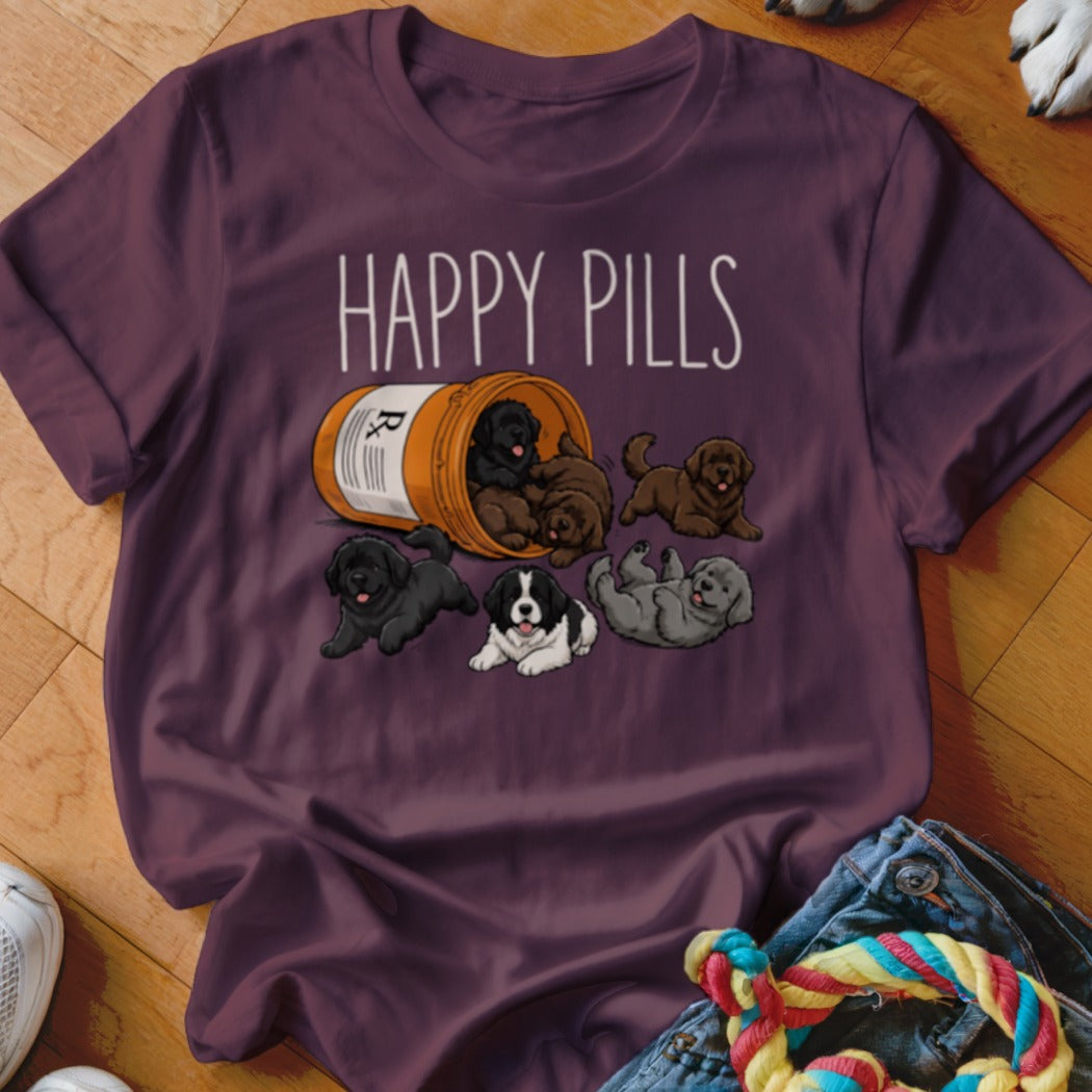 T-shirt with "HAPPY PILLS" text and an overturned pill bottle spilling puppies.
