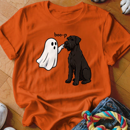 Ghost boops black schnauzer with text "boo-p" on orange t-shirt.