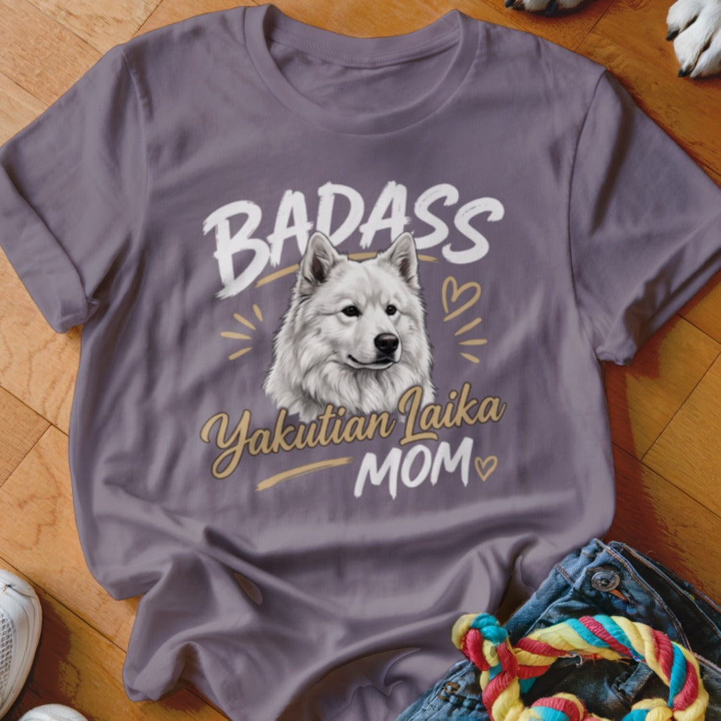 Purple t-shirt featuring an illustration of a Yakutian Laika and text reading Badass Yakutian Laika Mom.