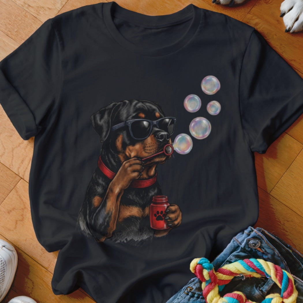 Black t-shirt featuring a graphic of a Rottweiler wearing sunglasses and blowing soap bubbles.