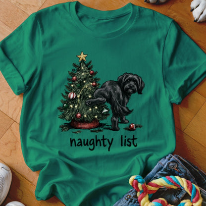 Black dog near Christmas tree with text "naughty list"