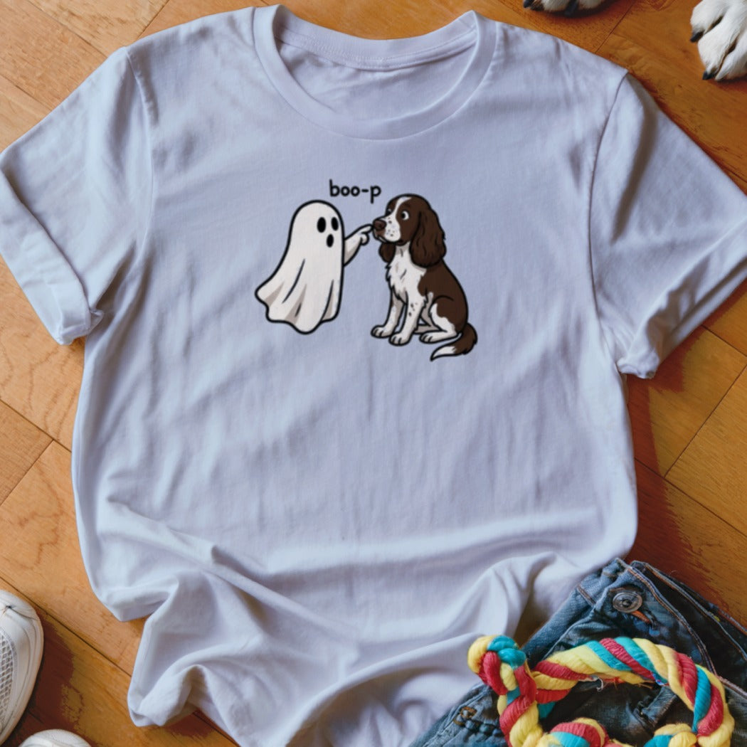 White t-shirt with a cartoon of a ghost booping a sitting brown and white dog, text says "boo-p".