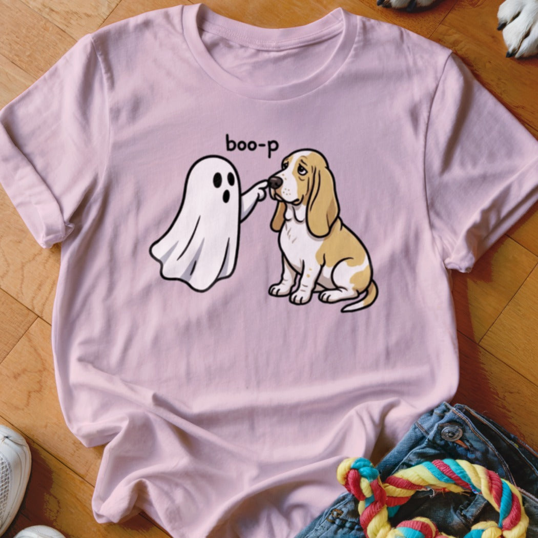 Pink t-shirt with a ghost "booping" a sad Basset Hound with the text "boo-p".