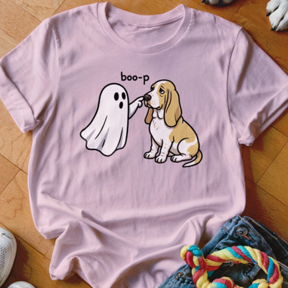 Pink t-shirt with a ghost "booping" a sad Basset Hound with the text "boo-p".
