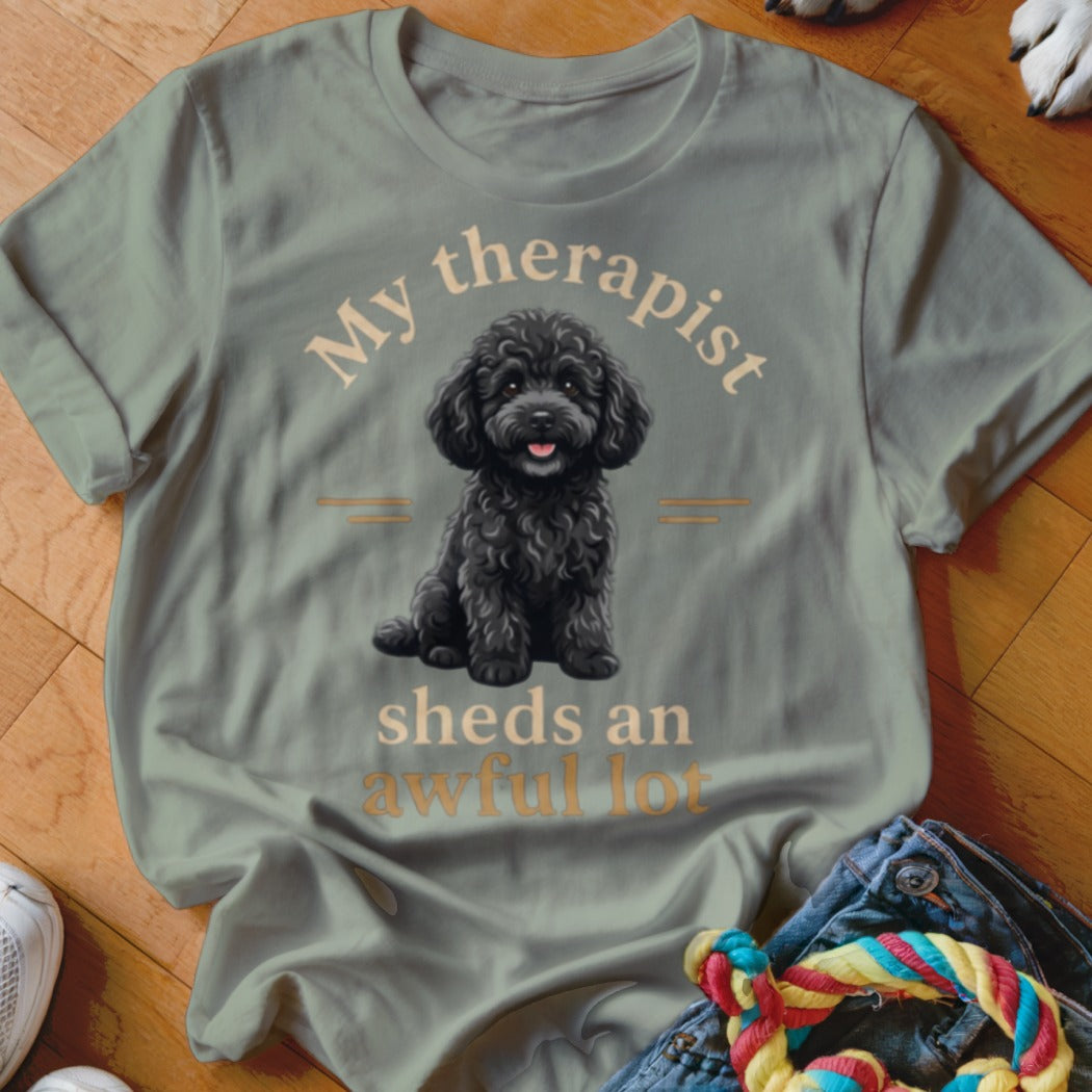 T-shirt with black poodle and text "My therapist sheds an awful lot."
