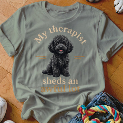 T-shirt with black poodle and text "My therapist sheds an awful lot."