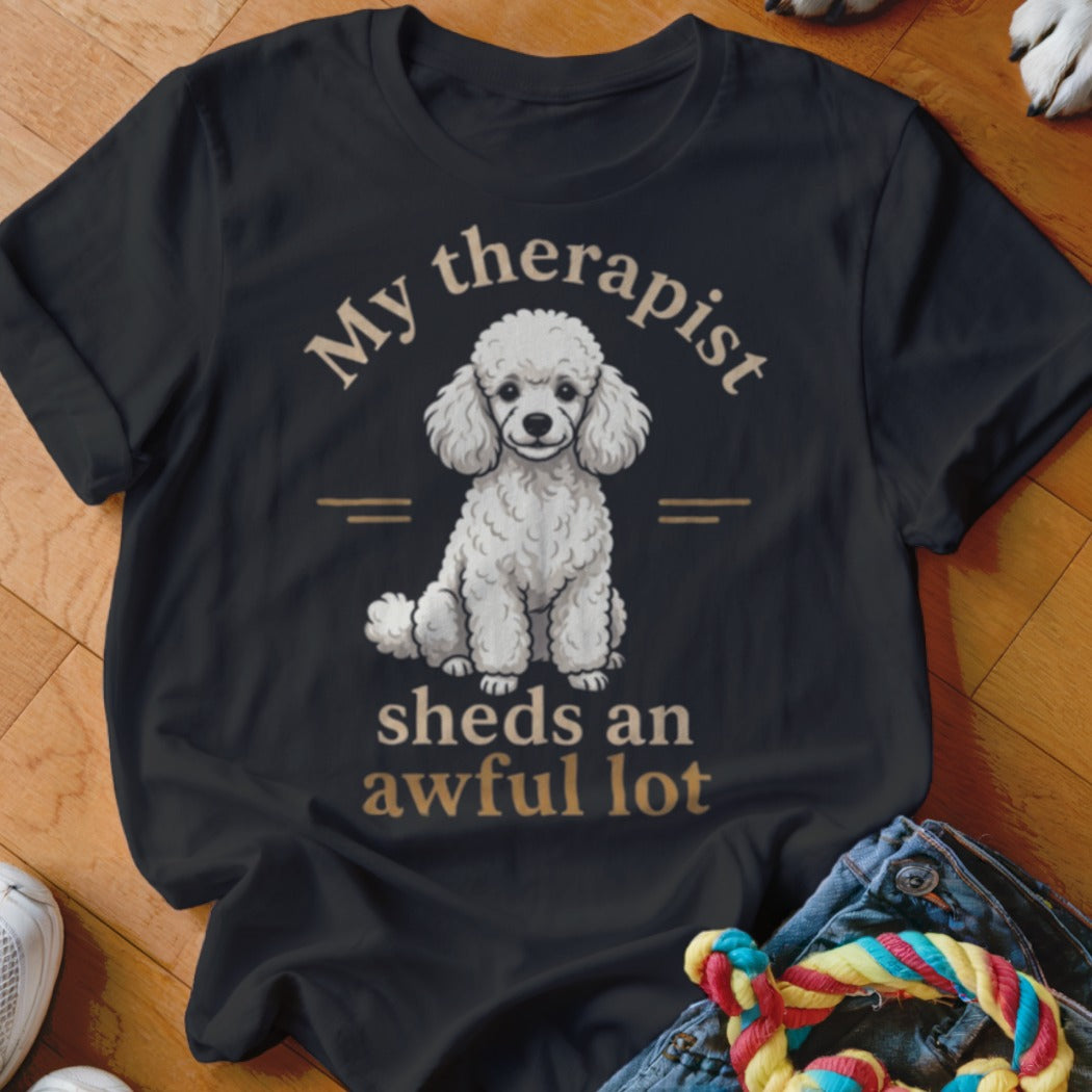 Black t-shirt with white poodle and text "My therapist sheds an awful lot".