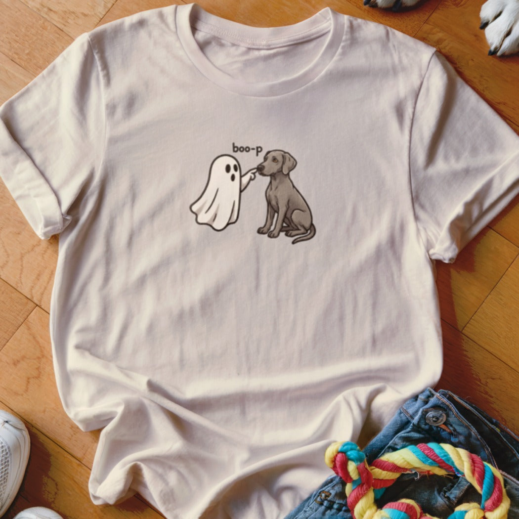 Ghost pokes dog nose with text "boo-p" on a white t-shirt.