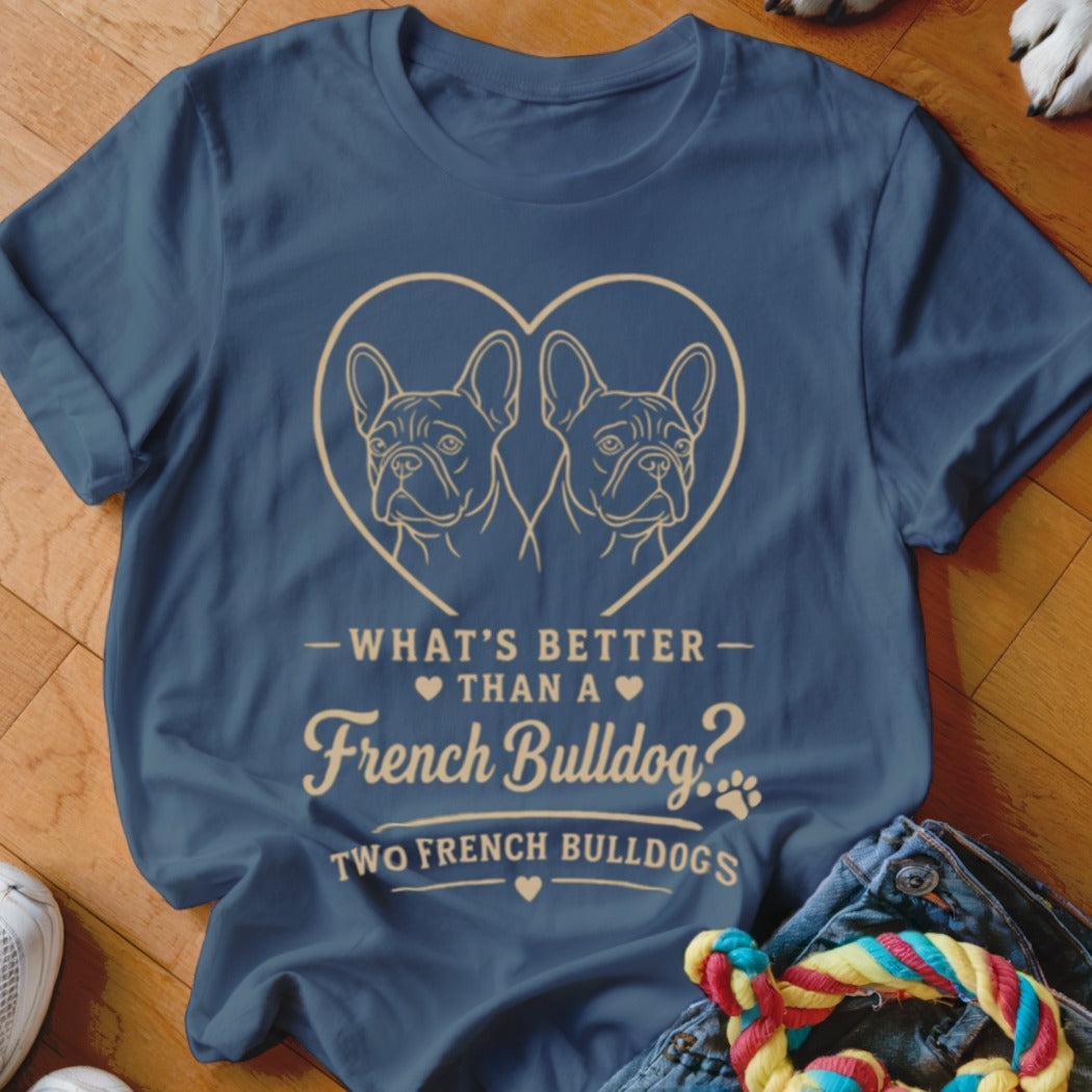 A dark blue t-shirt printed with two French bulldogs inside a heart and text.