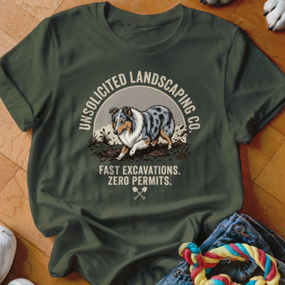 Green t-shirt with "UNSOLICITED LANDSCAPING CO. FAST EXCAVATIONS. ZERO PERMITS." text and dog graphic.