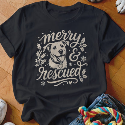 Black t-shirt with "Merry & Rescued" text and a dog graphic.