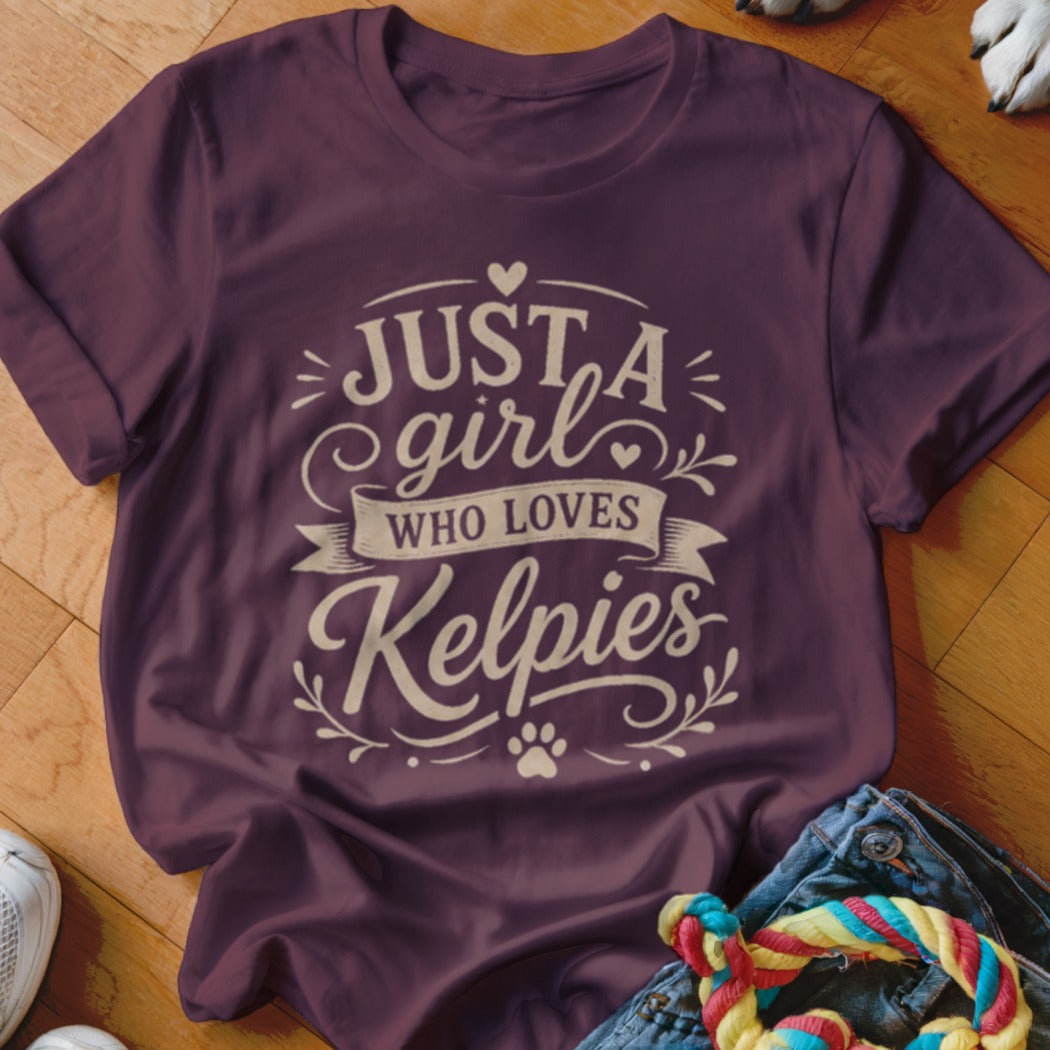Maroon t-shirt with text "Just a girl who loves Kelpies" in beige.