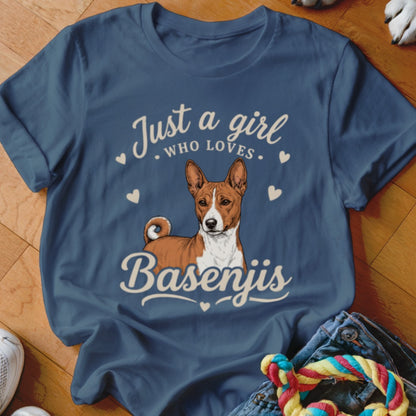 A blue t-shirt featuring a graphic of a Basenji dog and the text Just a girl who loves Basenjis.