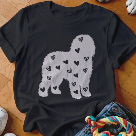 Black t-shirt with a white fluffy dog silhouette filled with black hearts.