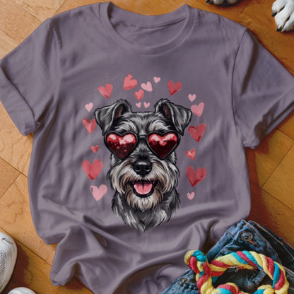 A gray crewneck t-shirt featuring a schnauzer wearing heart-shaped sunglasses surrounded by floating hearts.