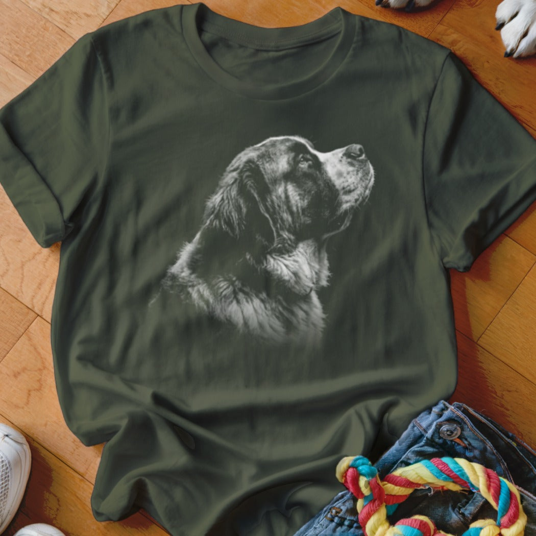 Olive green t-shirt with a black and white depiction of a dog's head looking up.