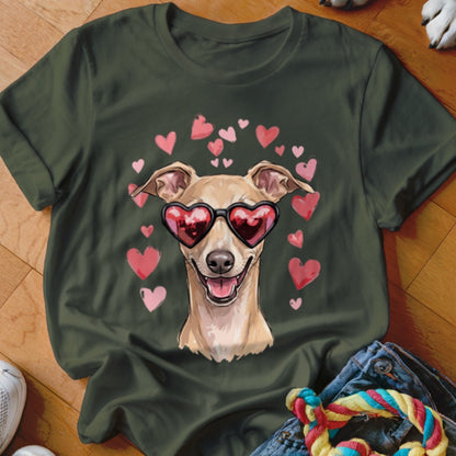 A dark green t-shirt featuring an illustration of a tan dog wearing heart-shaped sunglasses surrounded by pink hearts.
